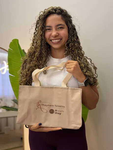 Paciente com a ecobag NutriTransforma